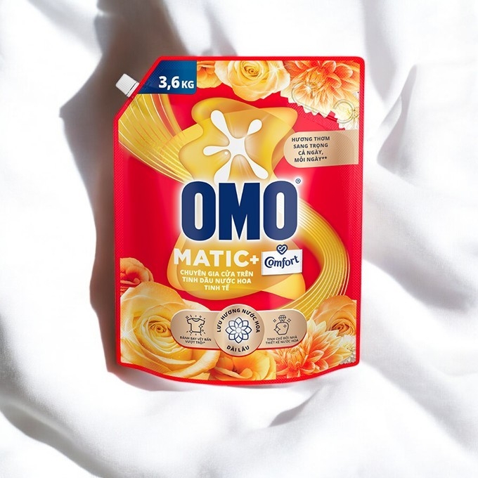Nước giặt OMO Cửa Trên Tinh Dầu Nước Hoa Tinh Tế 3.6kg